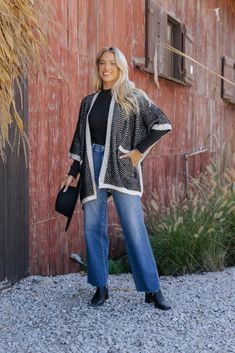 Wrap yourself in cozy elegance with the Fuzzy Black Herringbone Kimono, a stylish layer that effortlessly blends comfort and sophistication! Features short Kimono sleeves and an open front design for a relaxed, flowy fit. The Herringbone pattern adds a touch of timeless charm, making this piece versatile for casual or dressed-up looks. Crafted from a soft blend of acrylic and nylon for a plush, fuzzy texture. It's perfect for layering over your favorite tops and dresses, adding warmth and style to any outfit. Revival Clothing, Fall Style Guide, Black Herringbone, Gameday Dress, Casual White Dress, Short Kimono, Game Dresses, Kimono Sleeve, Basic Tops