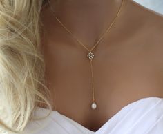 Lariat Necklace Crystal Wedding Bridesmaid Gift Simple crystal and freshwater pearl lariat necklace. Perfect for weddings or special events. IT'S IN THE DETAILS ✦ 14K Gold Filled Chain ✦ Cz Charm / Gold Plated over Brass ✦ Pearl Charm / Gold Plated over Brass ✦ Fresh water baroque pearls - approx 8 x 11mm WHY YOU'LL LOVE IT * Because handmade = made with love, care, and thought. * Ethically Sourced * Comes beautifully gift boxed * Crafted with care from sunny South Florida. ♡ HAPPINESS GUARANTEE Prom Necklaces, Pearl Lariat Necklace, Something Blue Bridal, Rings Blue, Pearl Lariat, Something Blue Wedding, Bridesmaid Pearls, Necklace Bridal, Wedding Gifts For Bridesmaids