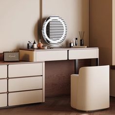 a white desk with drawers and a mirror on the wall next to it in an empty room