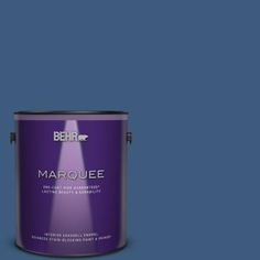 a purple paint can with the words marquee on it's bottom half