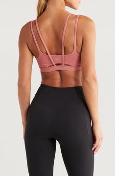 Signature Dri-FIT tech keeps you dry and comfortable in this strappy sports bra with a foam pad insert for extra coverage. Elasticized straps Dri-FIT moisture-wicking technology Lined 63% nylon, 37% spandex Machine wash, line dry Imported Sporty 4-way Stretch Activewear With Straps, Sporty Activewear With 4-way Stretch And Straps, Breathable Strappy Functional Activewear, Strappy Moisture-wicking Sports Bra In Athleisure Style, Functional Strappy Moisture-wicking Activewear, Functional Moisture-wicking Strappy Activewear, Moisture-wicking Strappy Sports Bra For Athleisure, Athleisure Strappy Sports Bra With Moisture-wicking, Athleisure Activewear With Straps For Light Exercise