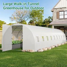 large walk - in tunnel greenhouse for outdoor growing plants on the side of a house