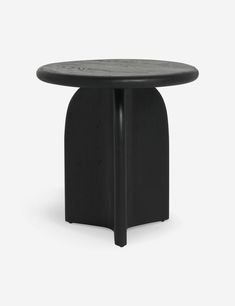 a small black table with an oval top