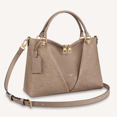 Louis Vuitton Women V Tote MM Embossed Monogram Empreinte Supple Grained Cowhide-Sandy Louis Vuitton Women, Mm Monogram, Leather Panel, Model Features, Louis Vuitton Official, Monogrammed Leather, Handbag Wallet, Wallet Accessories, Small Leather Goods