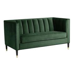 a green velvet sofa with wooden legs