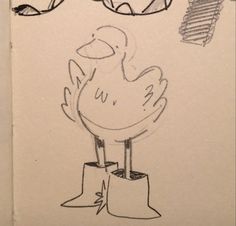 a drawing of a chicken sitting on top of a piece of paper next to a pair of glasses