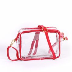 Trending Now! Game day style never looked so good, our new clear purse comes with 2 sets of straps! Change up your look between matching vegan leather or our new patterned shoulder straps. What’s to love about the Bridget: Crafted of clear vinyl and soft vegan leather, featuring brass hardware accents Stadium Approved Sized at 8" x 6" x 2" Includes 2 adjustable purse straps for changing up your look in a snap Easily wipes clean Zipper closure Quick Ship Times* + Easy Returns! If you are not over Auburn Football, Clear Purses, Alabama Roll Tide, Printed Purse, Clear Bag, Arkansas Razorbacks, Ole Miss, Clear Bags, Purse Strap