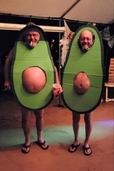 two men in costumes made to look like avocados