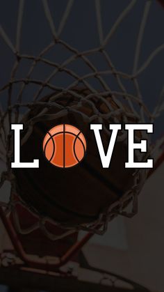 a basketball hoop with the word love above it and an orange ball in the net