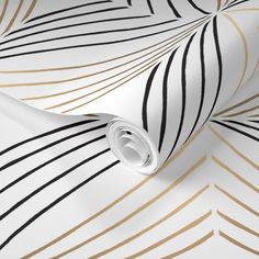 a white and gold wallpaper with black lines on it's side, as well as an abstract design