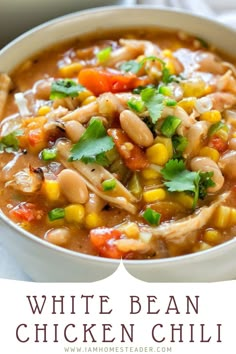 white bean chicken chili in a bowl with cilantro