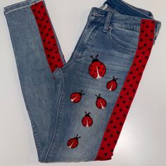 This Embellished Jean Brings Fun And Style To Your Life. You'll Fall In Love With This Beautiful, Cute And Unique Ladybug Jean With Ladybug Patches And Polka Dot Grosgrain Ribbon. This Jean Is Beautifully Designed For Your Long Term Enjoyment And Therefore Is In Need Of Your Tender And Loving Care. In Order To Preserve The Type Dye And The Precious Decorations That Make It Unique, It Is Highly Recommended To Dry Clean This Piece. Black American Eagle Jeans, Painted Jeans, Embellished Jeans, Womens Jeans, American Eagle Jeans, Lady Bug, Premium Denim, Black Skinnies, Grosgrain Ribbon