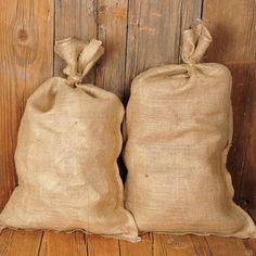 two burlock bags sitting next to each other on top of a wooden floor