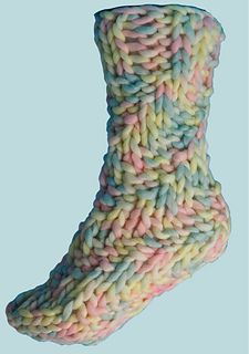 These fast and easy to knit super chunky socks do not require any heel shaping - the clever stitch pattern means that the socks hug your feet and legs without any faffy heel details to worry about. Chunky Socks, Socks Knitting Pattern, Pattern Meaning, Socks Knitting, Super Chunky Yarn, Bed Socks, Crochet Motif Patterns, Socks Pattern, Sock Knitting Patterns