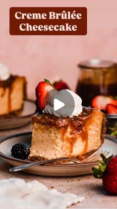 a piece of cheesecake on a plate with strawberries