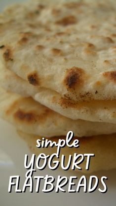 three flatbreads stacked on top of each other with the words, simple yogurt flatbreads