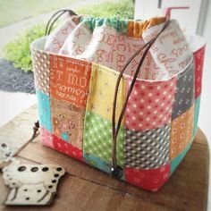 a colorful bag sitting on top of a wooden table