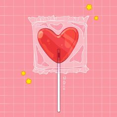 a heart shaped lollipop on a pink background