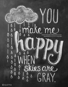 a chalkboard sign that says you make me happy when skies are gray