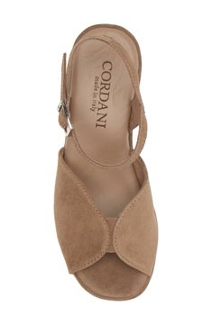 Pamper your feet in this Italian-made suede-wrapped sandal featuring a cushioned footbed and rocker platform for comfortable strides. A logo-bedecked tread pattern gives a signature finish for added style points. 3 1/4" heel Adjustable ankle strap with buckle closure Cushioned footbed Leather upper and lining/rubber sole Made in Italy Platform Wedge Sandals, Platform Wedge, Wedge Sandal, Sandal Women, Platform Wedges, Wedge Sandals, Rocker, Ankle Strap, Rubber Sole