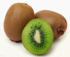 two kiwis cut in half on a white background