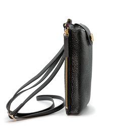 A miniature marvel of form and function, the Paris Phone Pouch holds all your necessary essentials securely in style. Made of gorgeous black Italian leather, it stores any sized phone in the main compartment, plus there’s also three credit card/ID pockets. Securing your phone in place with a top flap snap, this crossbody-style bag also has a side zipped section for keys and other must-haves. The Paris is perfect for a night out when a little bag goes a long way — just toss the adjustable 55" str Formal Black Shoulder Bag With Card Slots, Modern Black Bag With Hidden Phone Sleeve, Versatile Black Business Phone Bag, Black Business Shoulder Bag With Card Slots, Classic Black Shoulder Bag With Card Slots, Modern Black Phone Bag For Business, Classic Black Phone Bag For Daily Use, Black Business Phone Bag Pouch, Formal Crossbody Mobile Phone Wallet