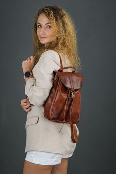 Women leather backpack "Kyiv"Comfortable to wear, custom design.high wear resistance,correct cut, emphasis on individual details.The perfect combination of cost, reliability and practicality..📌 Material: genuine leather, leather thickness 1.6mm;- 1 main compartment;- 1 inside pocket;- Adjustable straps (65-85cm);- The cover of the backpack is fixed on the carabiner; - A pen. 📌 Product dimensions:• Height: 29 cm.• Width: 20 cm.• Thickness: 11 cm..💼Leather Workshop ➤Producer👜Designer items💕Ha Gents Shoes, Handmade Leather Backpack, Leather Workshop, Women Leather Backpack, Funky Fashion, Designer Items, Women Leather, Handcrafted Leather, Nice Leather