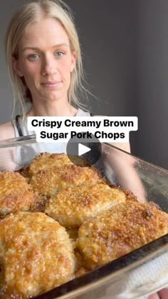 a woman holding a pan full of food with the words crispy creamy brown sugar pork chops