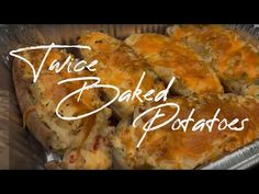 baked potatoes in a tin with the words twice baked potatoes