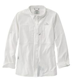 a white button up shirt with an embroidered logo on the left chest and long sleeves