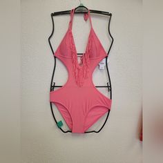 Show Off Your Shape With This Soft And Comfortable One Piece Swimsuit. Features A Deep V-Neck Front With Fringe Detail, Halter Style Top With Tie Closures, Full Coverage Bottoms, And Fully Lined Material. Multicolor V-neck Swimwear With Lined Body, Fitted Multicolor V-neck Swimwear, Orange V-neck Swimwear For Pool, Pink V-neck Beachwear Bodysuit, Monokini Swimsuit, Nylon V-neck Beachwear Bodysuit, Swimsuit Black, Monokini Swimsuits, Halter Style