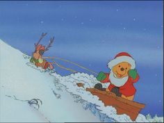 winnie the pooh and his reindeer friends are on top of a snowy hill with snow