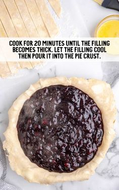 a pie with blueberry filling on top and the words cook for 2 minutes until the filling becomes thick let the filling cool then pour it into the pie crust