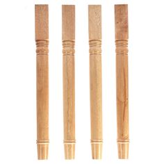 four different sized wooden pens lined up in a row