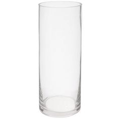 a tall glass vase sitting on top of a white table