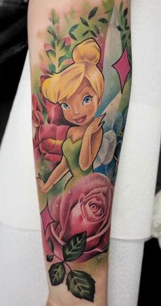 60+ Amazing Tinker Bell Tattoo Designs with Meanings, Ideas, and Celebrities 59 Disney Tattoos Tinkerbell, Heavens Tattoo, Halloween Inspired Tattoos, Tinkerbell Tattoo, Bell Tattoo, Film Peter Pan, Tinker Bell Tattoo, Belle Tattoo, Disney Sleeve