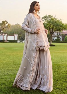 Ivory kurta with thread, sequin, pearl, bead embroidery in floral pattern. Paired with pleated embroidered sharara & scallop border embroidered dupatta. Kurta And Sharara Set, Kurta And Sharara, Embroidered Sharara, Desi Outfits, Scallop Border, Beautiful Pakistani Dresses, Colour Combos, Desi Style, Embroidered Dupatta