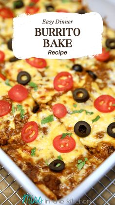 an easy dinner burrito bake recipe with olives, tomatoes and cheese on top