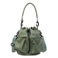 Multi-Pocket Drawstring Bucket Bag Width Height Thickness Handle Length 24 24 14 26 measurement is cm.Product Information Material: 100% Nylon Color: Black Wash care: Hand Wash, Wipe Clean Drawstring Bucket Bag, Pretty Bags, Sierra Leone, Trendy Fashion Women, Green Bag, Haiti, Ghana, Bucket Bag, Cleaning Wipes