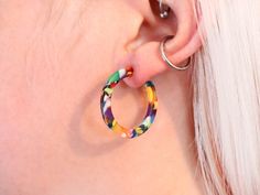 Multi Coloured Hoop Earrings made with acetate & silver stainless steel posts. Hoop Size - 32mm We have multiple other listings of earrings and more please take a look at our shop! Please note, that there may be some variations that can occur including finish and colour compared to the photos on a digital screen. Postage Standard postage within the UK is Royal Mail 1st Class, this is FREE  If you need your item sooner, upgrade to 1st class, 1st class signed for, or guaranteed next day Internatio Multicolor Round Hoop Earrings, Multicolor Pierced Round Hoop Earrings, Everyday Multicolor Hoop Earrings, Everyday Multicolor Circular Earrings, Everyday Multicolor Circle Earrings, Acrylic Hoop Earrings, Simple Hoop Earrings, Digital Screen, Small Hoop Earrings