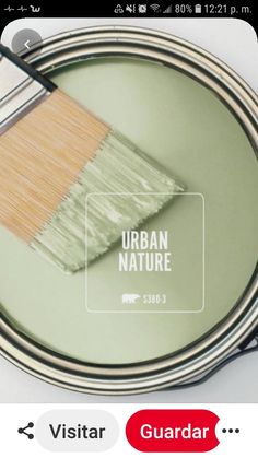 a paint can with a brush on it and the caption reads, visit urban nature