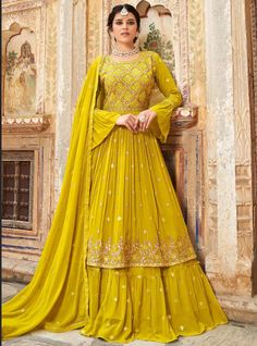 Yellow Haldi Georgette Indian Pakistani Long Salwar Sharara SFZ127578 Fabric - Kameez : Georgette ; Bottom : Georgette ; Dupatta : Net Work - Embroidery work, Stone work, Zari work Fully Stitched/Customised Products, you will receive measurements in an Email. All our products can be customised to your SIZE and STYLE DELIVERY INFO : - Un-stitched And Semi-stitched estimated delivery time for the UK & Worldwide is 1-2 Weeks. -Fully stitched item estimated delivery time for the UK & Worldwide will be 3 weeks from the time we receive your measurements. WASH CARE : - First wash of the garment should always be Handwash or Dry cleaned. Long Salwar, Indo Western Lehenga, Long Choli Lehenga, Yellow Dupatta, Bottom Heavy, Modest Evening Dress, Georgette Lehenga, Yellow Lehenga, Georgette Dupatta