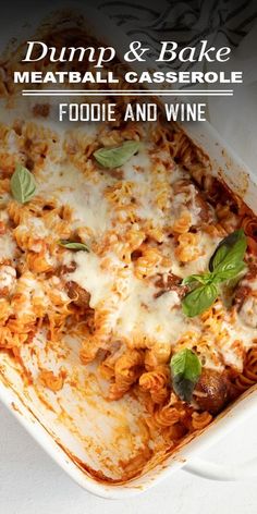 a casserole dish with meat and cheese on top, in a white pan