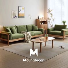 a living room with two green couches and a coffee table