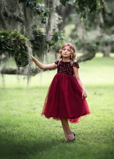 A little sparkle and a little glam, this ruby red frock will have all eyes on her! A stretch sequin bodice, fully lined with soft cotton, sits above a bountiful tulled skirt, perfect for the girl and her twirl. Fully lined with soft cotton and back zips. Machine wash, hang dry. Blush Sequin Dress, Belle Gown, Pink Toddler Dress, Sequin Holiday Dress, Red Frock, Bianca Dress, Satin Flower Girl Dress, Tulle Flower Girl, Flower Girl Dresses Tulle