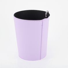 a purple leather cup holder with black lining