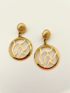 Gorgeous vintage polished gold earrings with coral branches in ivory enamel. Excellent vintage condition. 2.25" drop. post back. Please Note: All of these items are vintage. They have been pre-loved and are not in pristine condition. I try to take photos of any areas of concern. Please ask for more photos if you have any concerns about the condition of a piece. Returns will only be accepted if there is damage in shipping. I Try, More Photos, Jewelry Earrings Dangle, Gold Earrings, Etsy Earrings, Dangle Drop Earrings, Dangle Earrings, Etsy Accessories, Coral