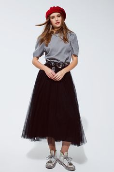 Discover the magic of our Black Tulle Midi Skirt, a piece that channels the elegance of a ballerina with the versatility for everyday style. Ballet-Inspired Elegance: This skirt's fluffy layers of soft tulle create a romantic, ethereal silhouette that echoes the grace of a dancer's attire. Comfort Meets Style: An elastic waistband ensures a snug, comfortable fit that adjusts to your body, allowing you to move freely and with confidence throughout your day. Material Mastery: Crafted from 100% pol Fall Party Tulle Skirt, Fall Tulle Pleated Skirt, Fall Party Tulle Bottoms, Fall Pleated Tulle Skirt, Chic Tulle Skirt For Fall, Fall Tiered Tulle Skirt, Black Tulle Skirt For Fall, Fall Tulle Long Skirt, Black Tulle Maxi Skirt For Summer