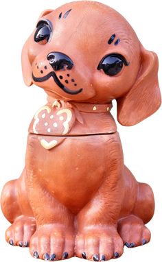 a ceramic dog figurine with a heart on it's collar