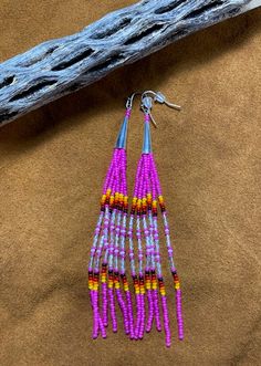 Native American inspired/designed fringe earrings are lovingly handcrafted. They are hand beaded, one bead at a time, with glass seed beads.  They are 4.5" long with a silver plated cone on the top.

I also do custom orders / colors. These will have at least a week added to the shipping time, depending on how many are needed. Simple Beaded Earrings, Native American Beadwork Earrings, Pink Beaded Earrings, Native Earrings, Beaded Earrings Diy, Native American Beaded Earrings, My Community, Earrings Diy, Earring Ideas